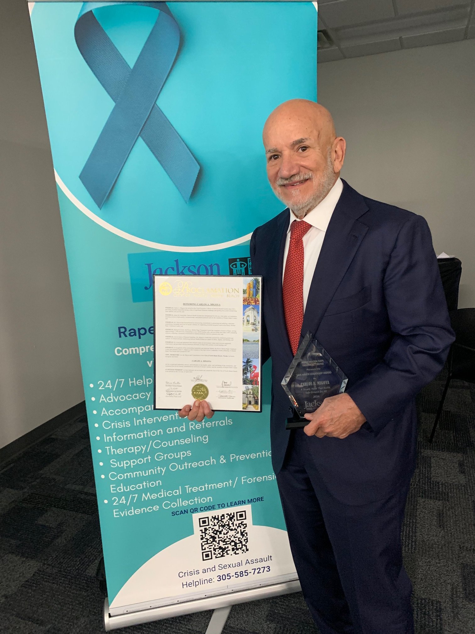 Carlos A. Migoya receiving the Safe Haven Leadership Award and the City of North Miami Beach Proclamation