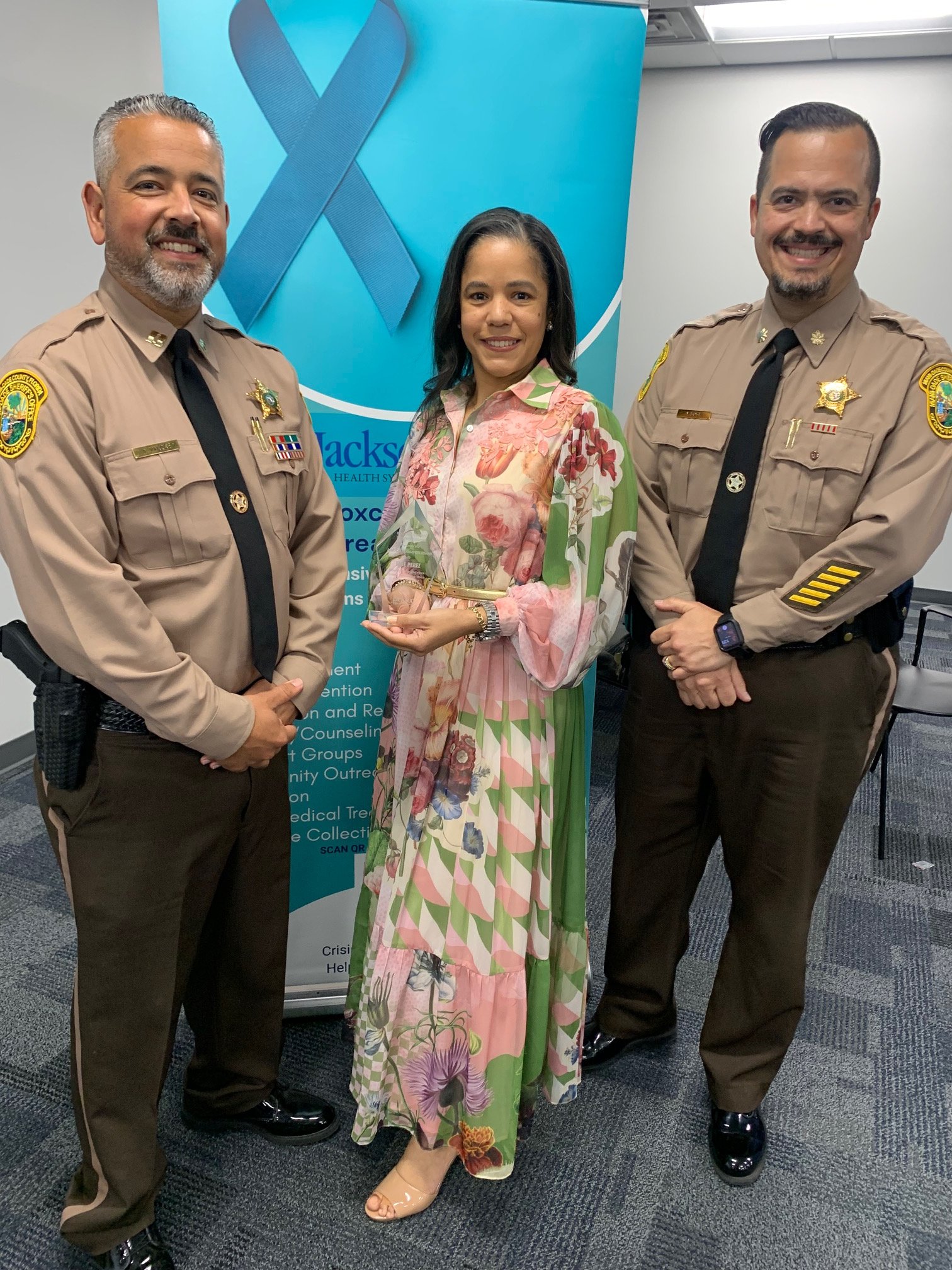 Advocacy Champion Award honoree Elke Perez (MDSO) with Miami-Dade Sheriff's Office representatives